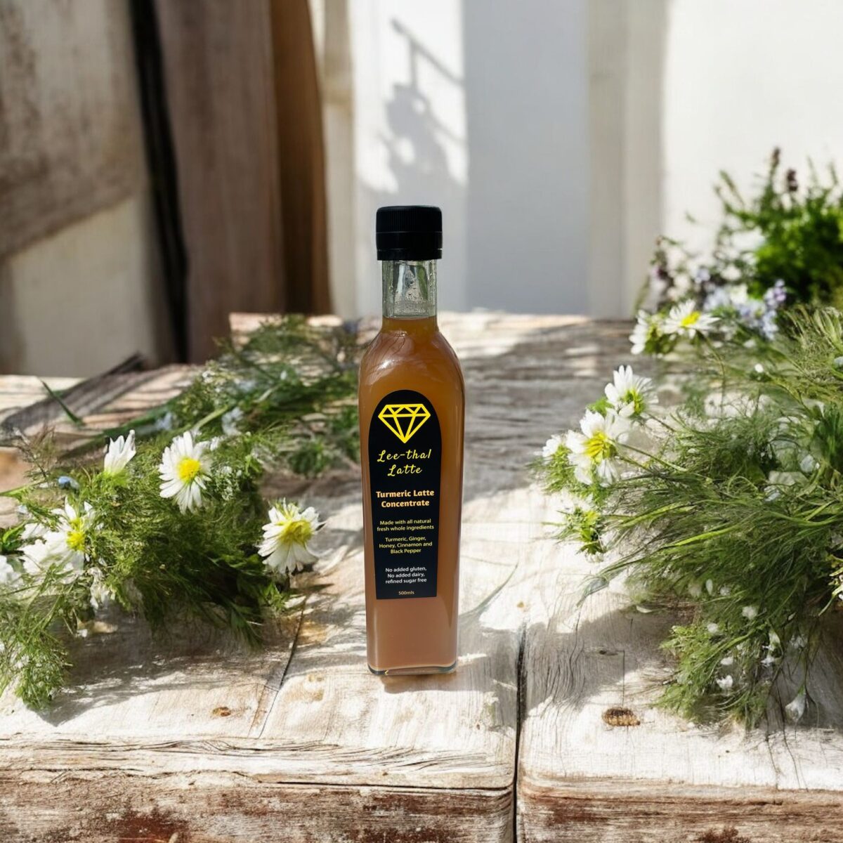 "Blooming blend in nature's cafÃ©: Garden flowers with a touch of turmeric in the grass."