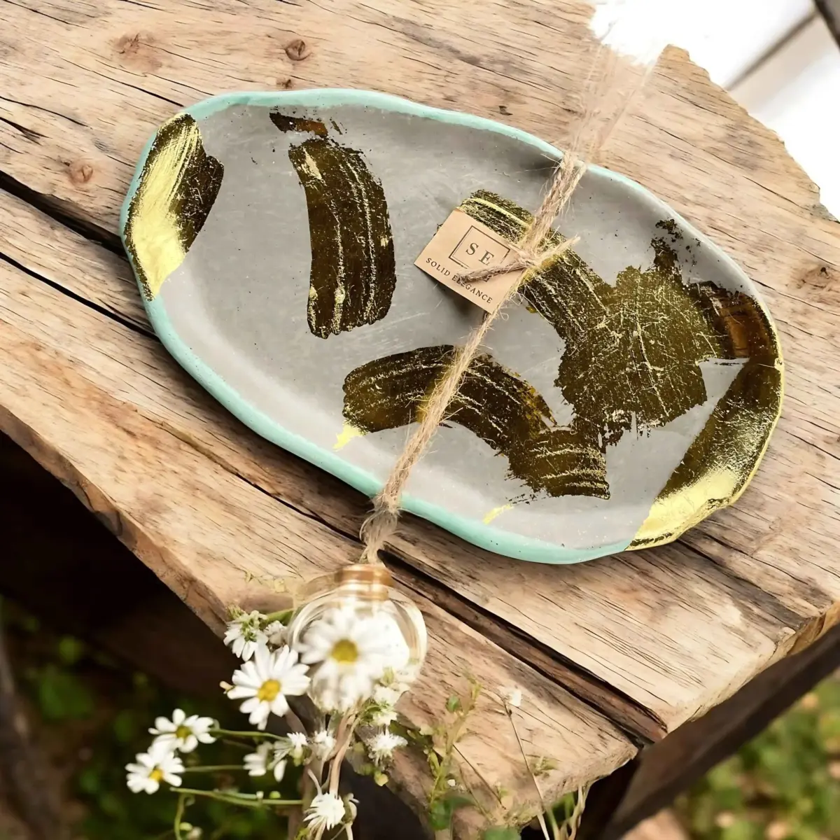 "Rustic Elegance: Delicate Garden Flowers and Refined Tableware at Cottage Emporium