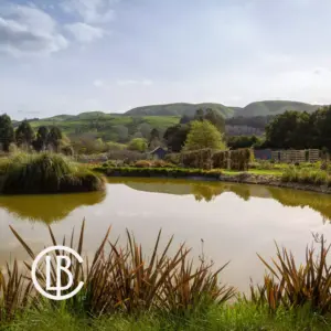 Longbush Gardens View Across Lake Logo